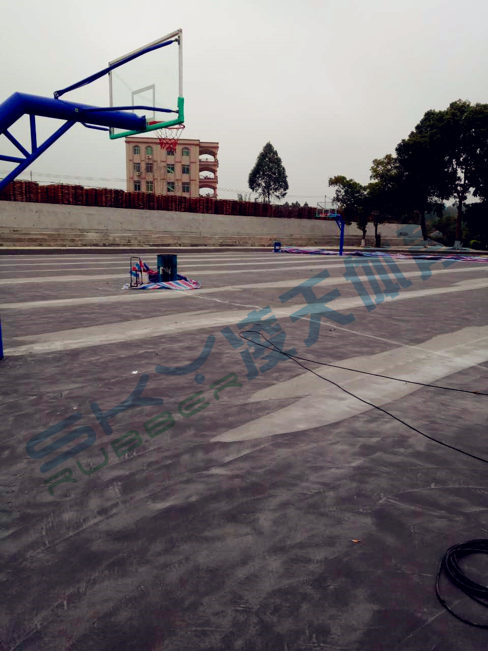 丙烯酸蓝球场案例：江门市鹤山宅梧小学弹性丙